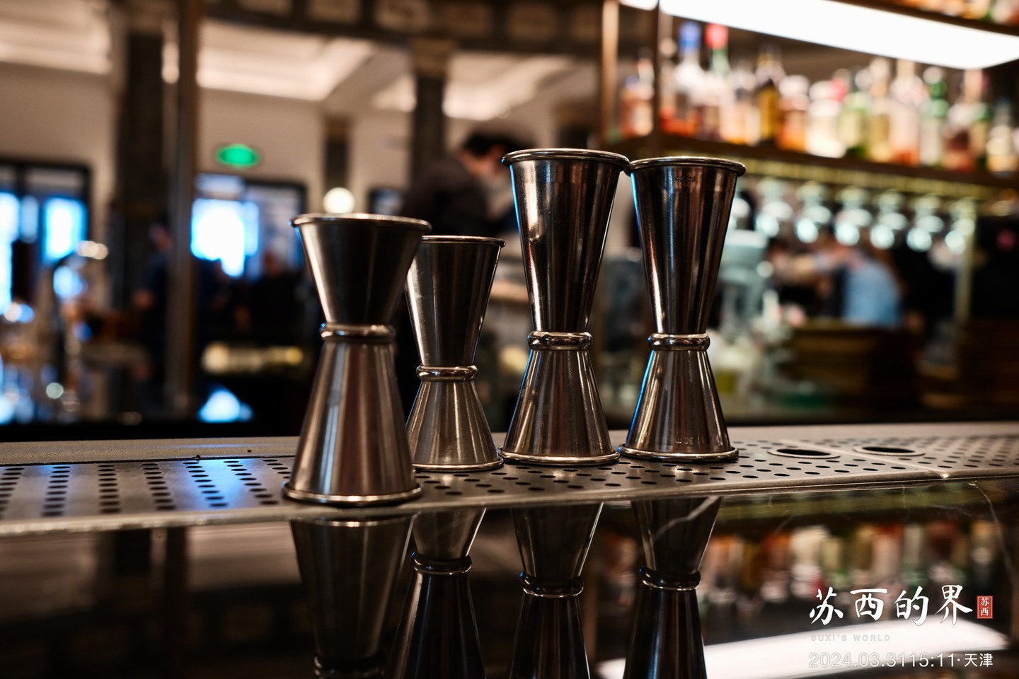 Bar jiggers and their reflections